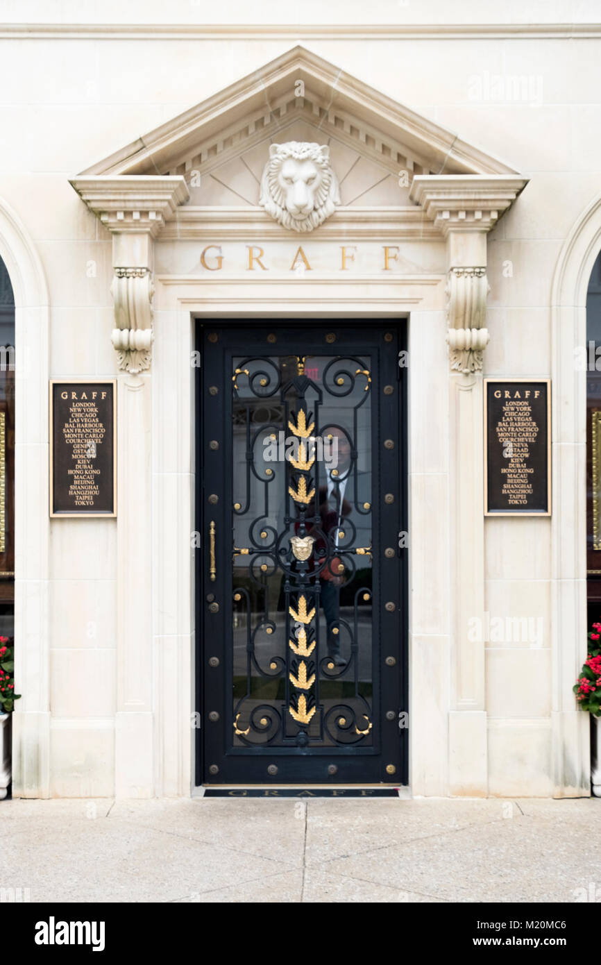 The exterior and entrance to Graff, a high end jewelry store on Worth Avenue in Palm Beach, Florida. A security man stands in the doorway. Stock Photo