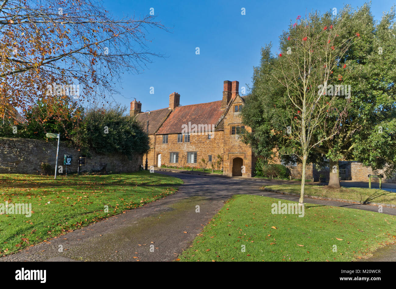 Mellow stone houses gathered around the green in the pretty village of Eydon, Northamptonshire