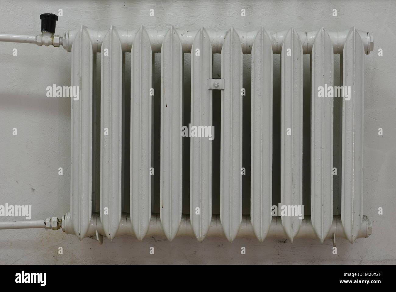 Old cast iron radiator Stock Photo Alamy