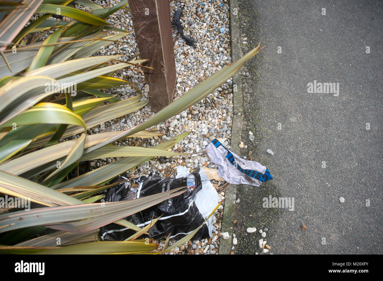 Sneaky dumping of rubbish on the street Stock Photo Alamy