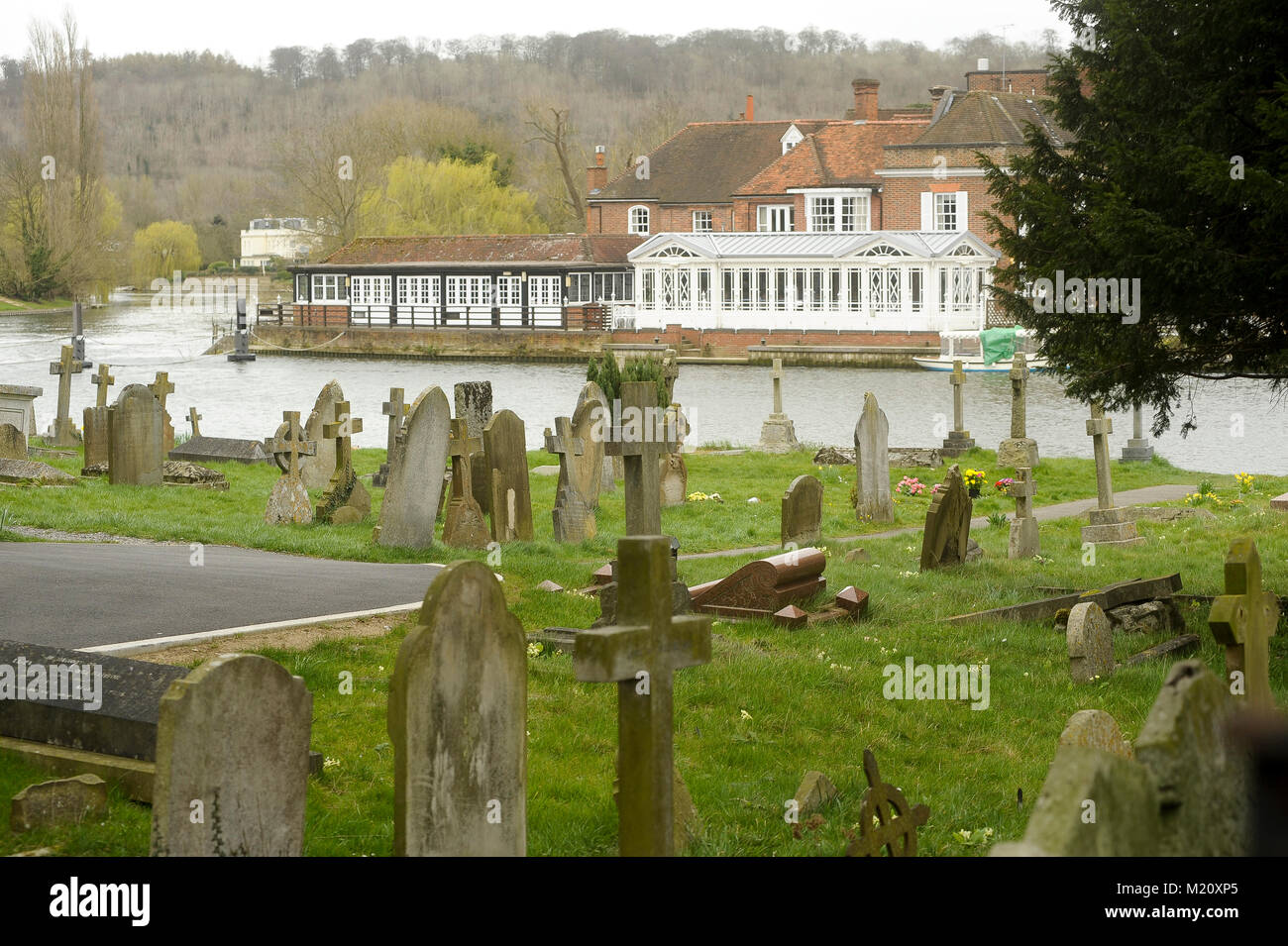 All Saints Churchyard by the River Thames and The Compleat Angler Hotel in Marlow, Buckinghamshire, England, United Kingdom. April 1st 2015 © Wojciech Stock Photo