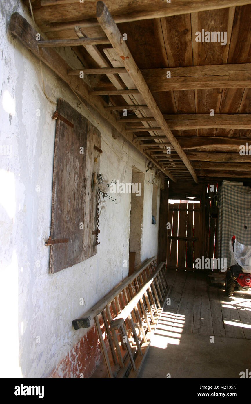 Ladders at old farmhouse in North of Italy Stock Photo Alamy