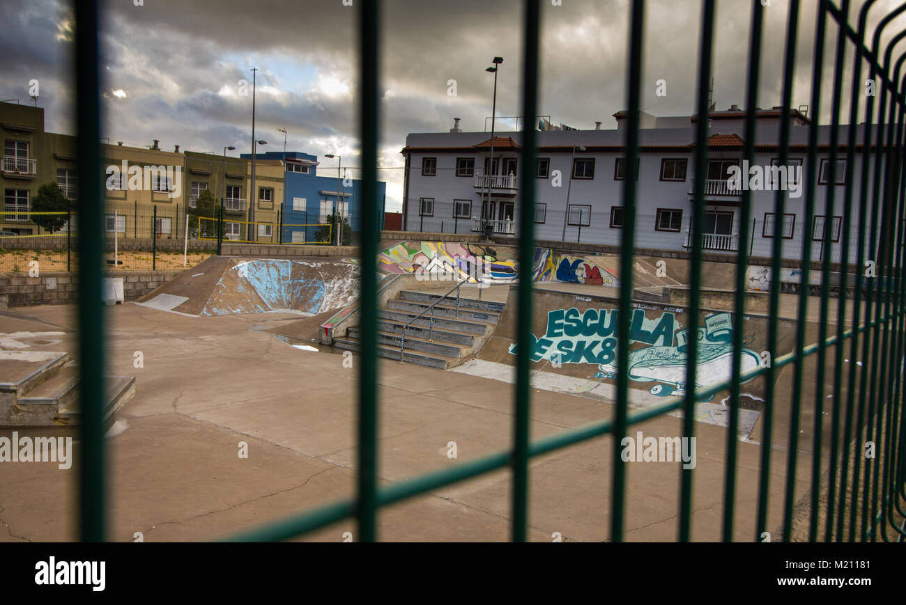 Canary islands concrete skate park viewed through metal railings at Los Realejos, Tenerife 2016 Stock Photo