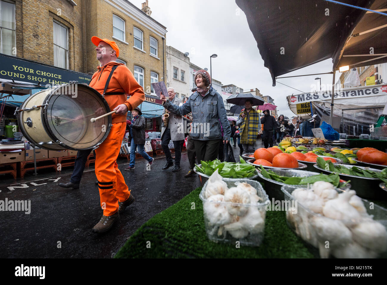 London, UK. 3rd Feb, 2018. Local residents celebrate the return of the iconic Deptford Anchor with a celebratory musical procession as the anchor is finally returned to its original place at the south end of Deptford High Street after being removed in 2013 . Credit: Guy Corbishley/Alamy Live News Stock Photo