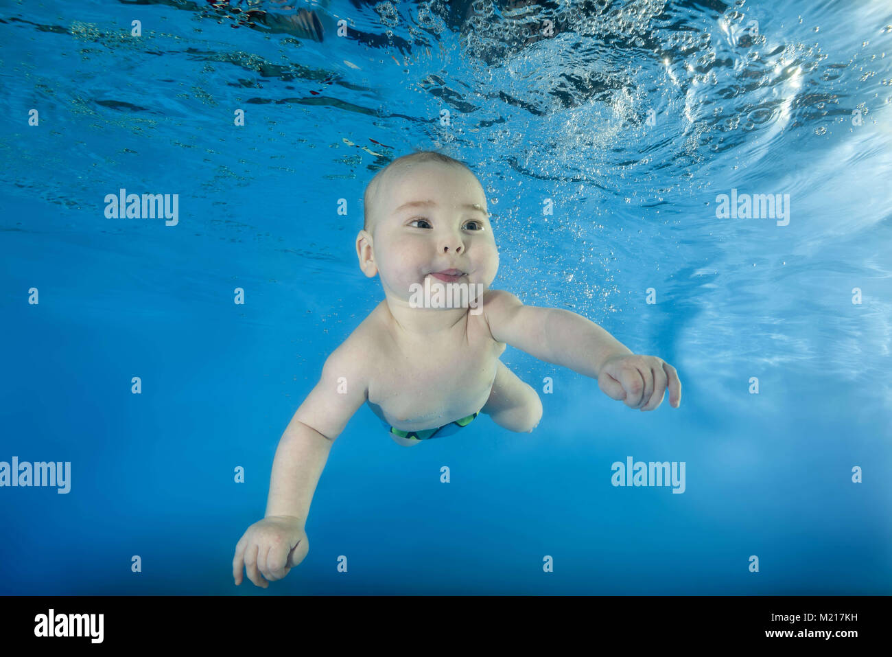 Odessa, Ukraine. 31st Jan, 2018. little boy learns to swim underwater