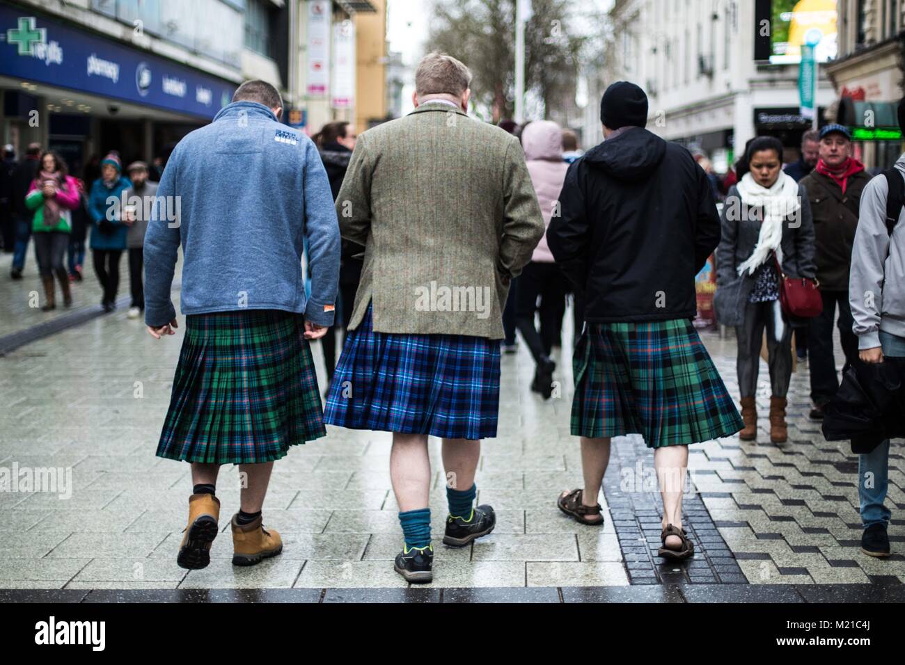 UNITED KINGDOM, WALES. 03 February 2018. Scottish fans make their way to the Stadium in the rain. Credit: Lorna Cabble/Alamy Live News Stock Photo