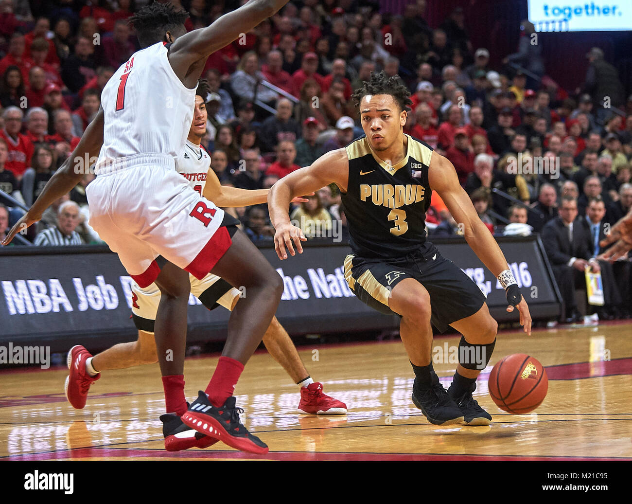 Piscataway, New Jersey, USA. 3rd Feb, 2018. Purdue Boilermakers guard Carsen Edwards (3) penetrates toward the basket as Rutgers Scarlet Knights forward Candido Sa (1) defends in the first half at Rutgers Athletic Center in Piscataway, New Jersey. #3Purdue defeated Rutgers 78-76. Duncan Williams/CSM/Alamy Live News Stock Photo
