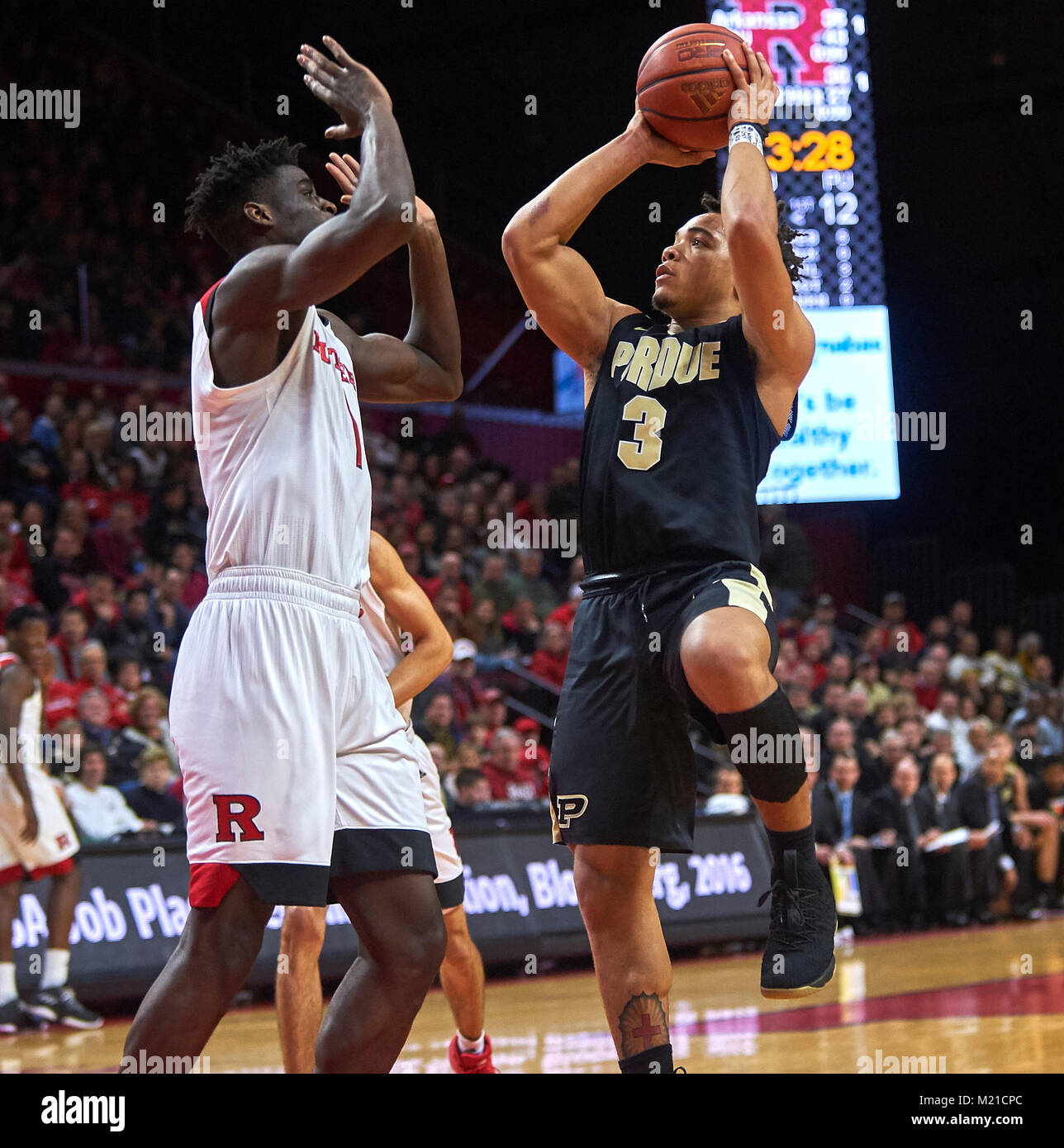 Piscataway, New Jersey, USA. 3rd Feb, 2018. Purdue Boilermakers guard Carsen Edwards (3) drives to the basket as Rutgers Scarlet Knights forward Candido Sa (1) tries to defend in the first half at Rutgers Athletic Center in Piscataway, New Jersey. #3Purdue defeated Rutgers 78-76. Duncan Williams/CSM/Alamy Live News Stock Photo