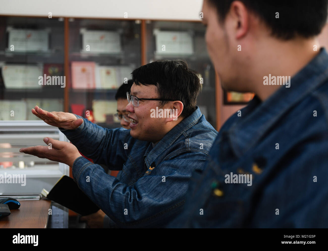 Nanjing, China's Jiangsu Province. 1st Dec, 2017. Deng Jianjun (2nd R ...
