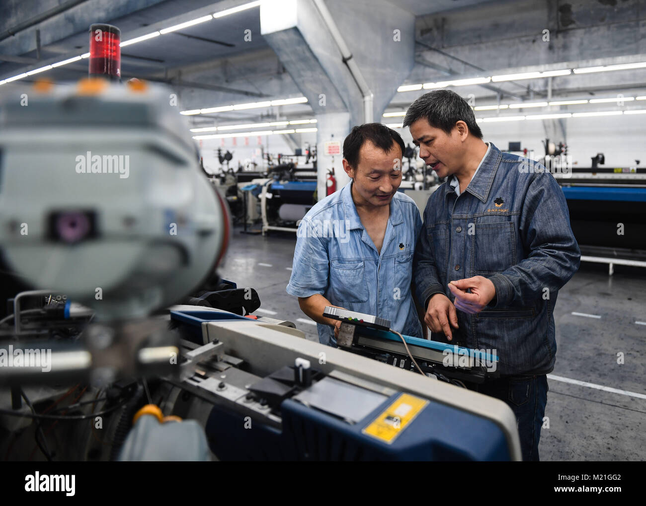 Nanjing, China's Jiangsu Province. 1st Dec, 2017. Chen Weihua (R), a ...