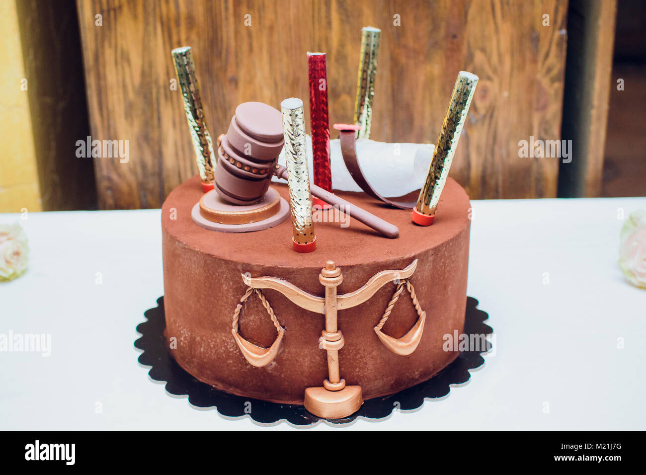 Bride and groom cake topper couple with legal gavel Stock Photo - Alamy