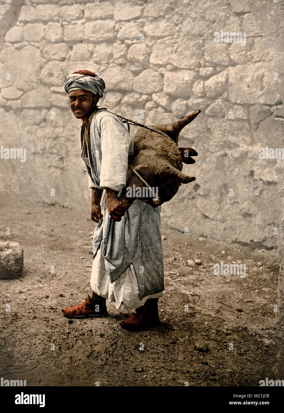 c.1890's Photochrome Egypt water carrier Stock Photo Alamy