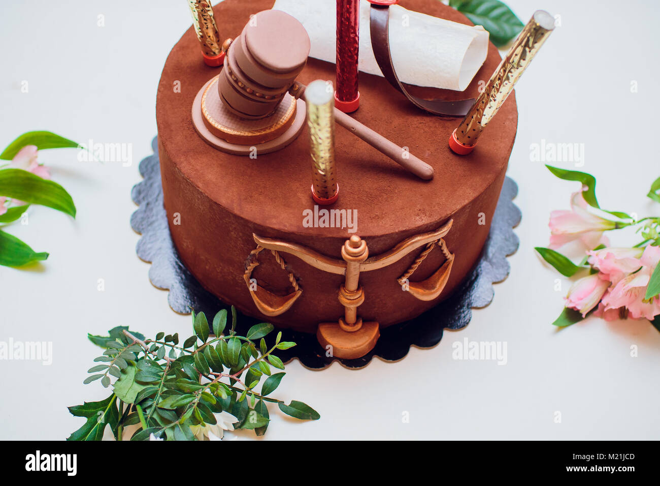 Bride and groom cake topper couple with legal gavel Stock Photo Alamy