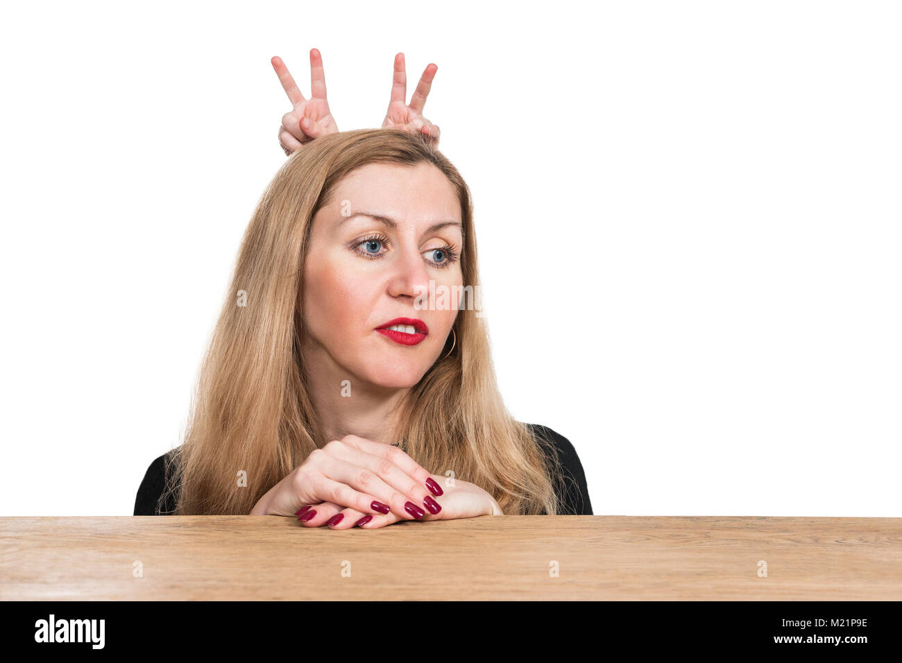 Portrait of a woman with horns Stock Photo Alamy