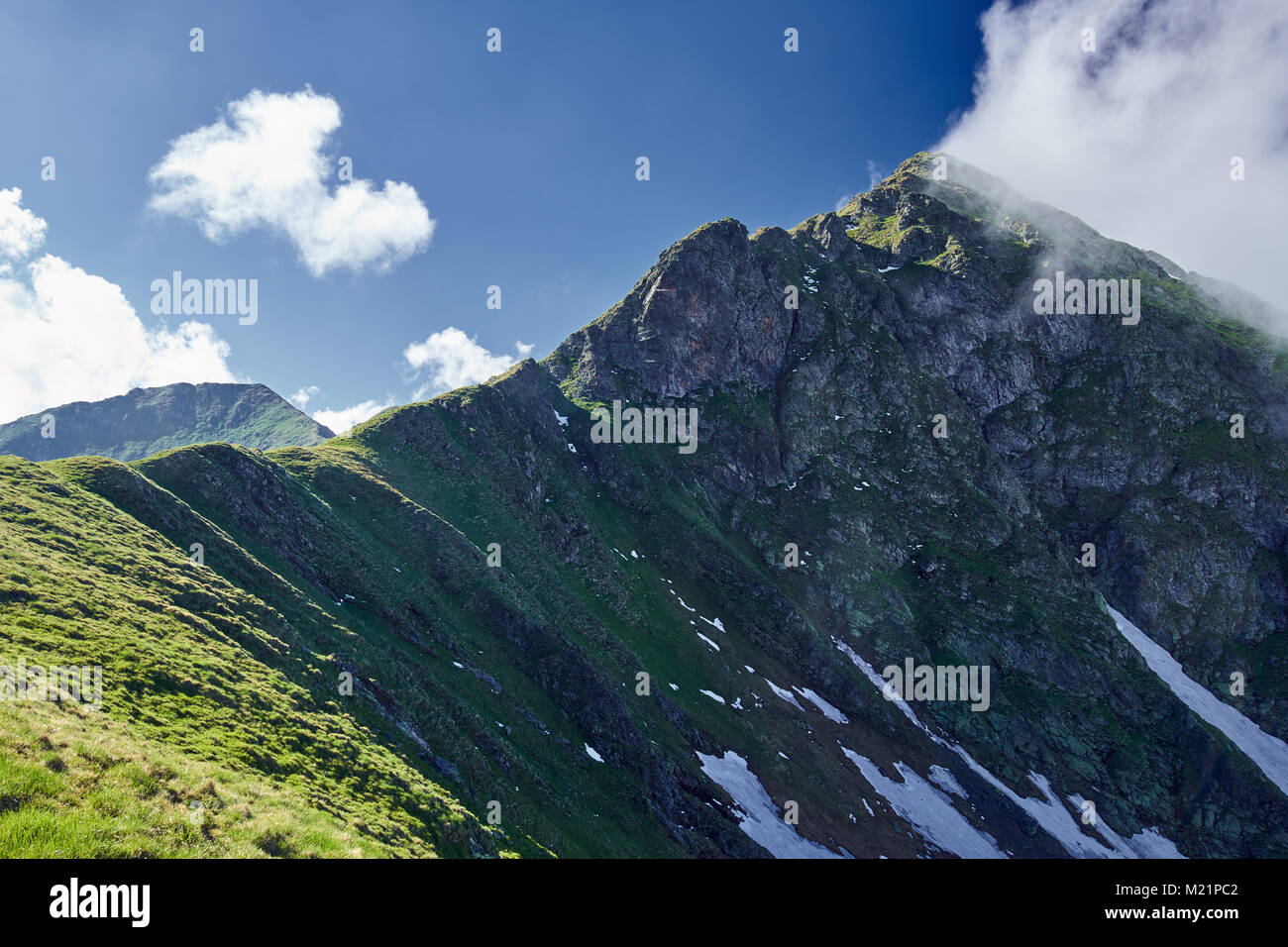 Landscape with mountains in a sunny spring day Stock Photo - Alamy