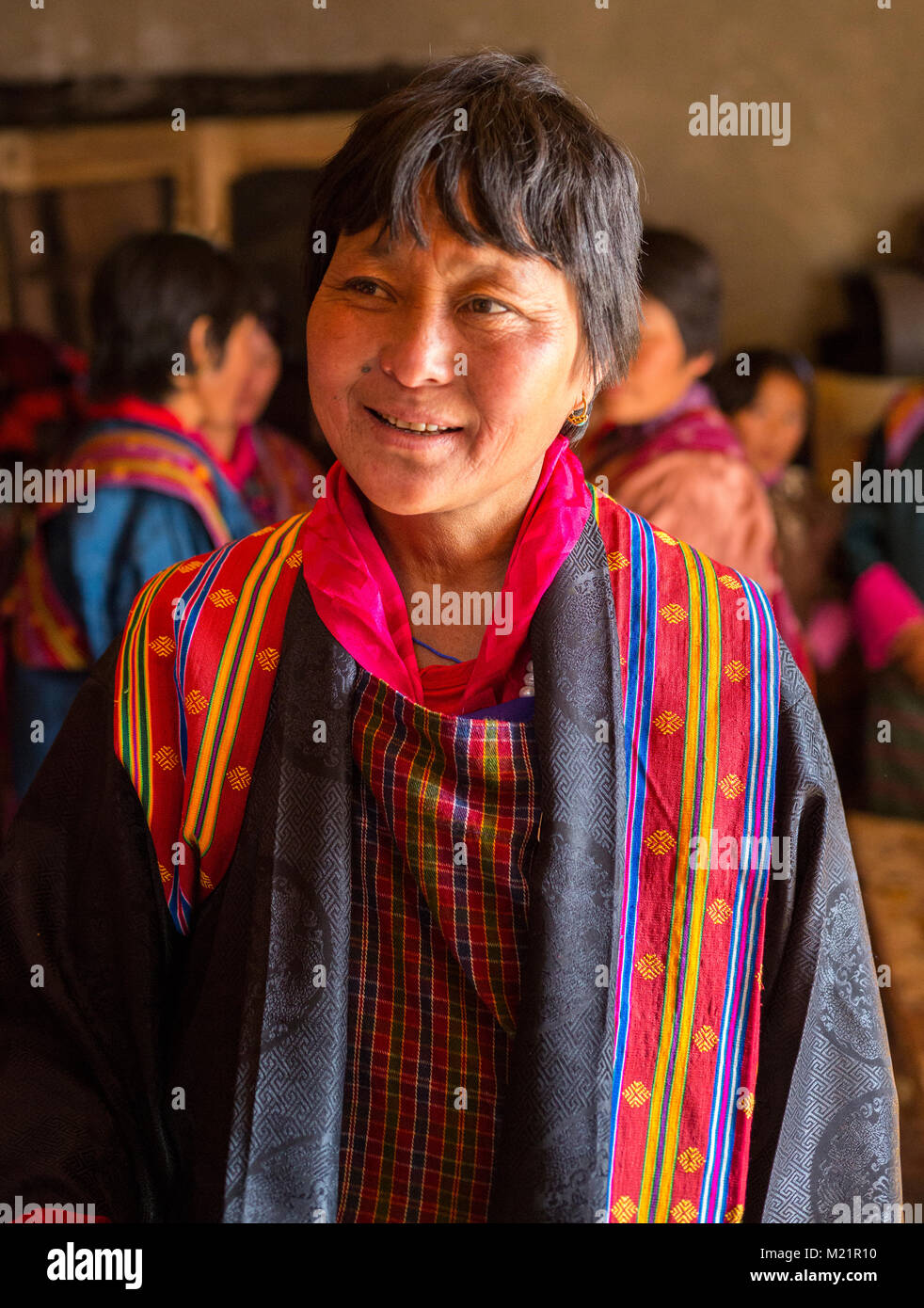 Prakhar Lhakhang, Bumthang, Bhutan.  Bhutanese Woman in Traditional Dress. Stock Photo