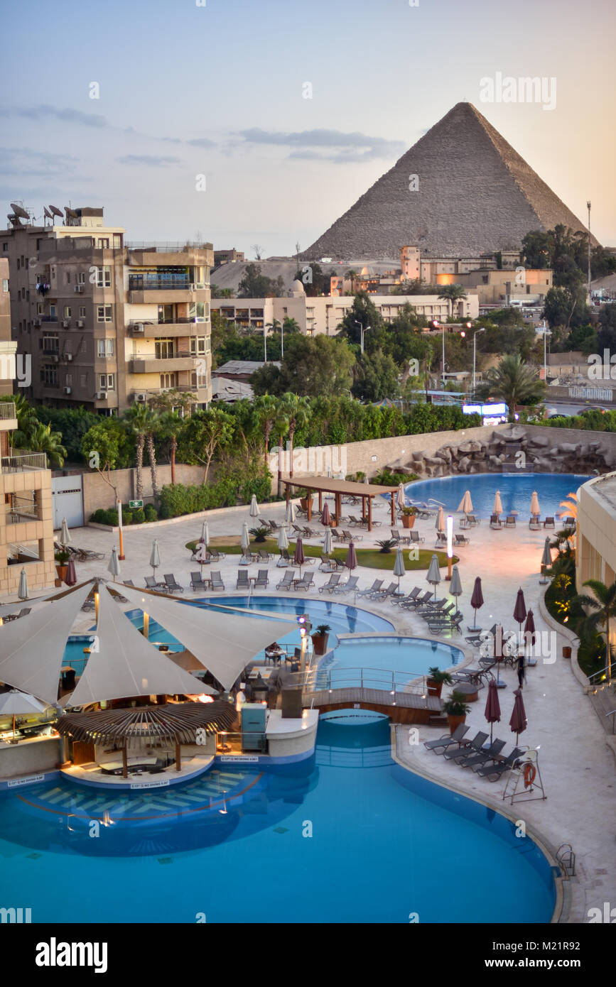 Egypt at sunset with the great pyramid and pool Stock Photo