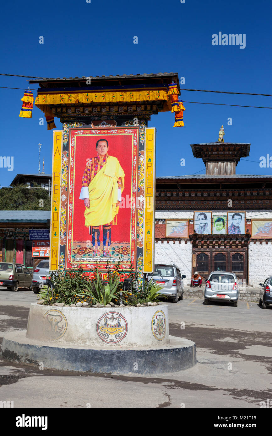 Jakar, Bumthang, Bhutan.  Traffic Circle with Portrait of Former King Jigme Singye Wangchuck, Reigned 1972-2006. Stock Photo