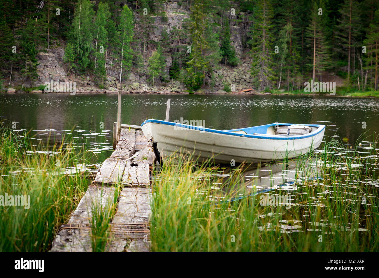 Small boat on a Idyylic Lake Norway Stock Photo