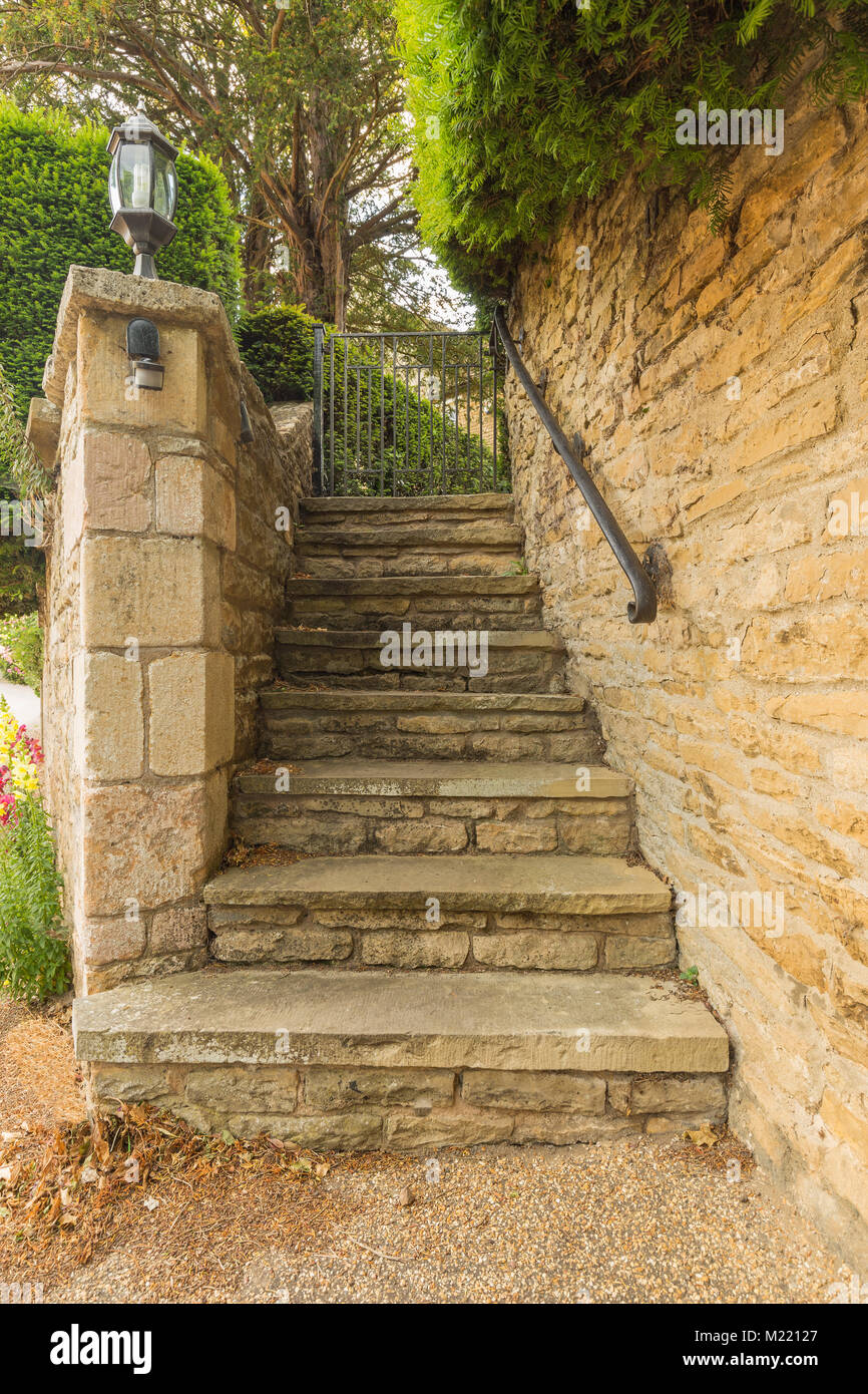 Beautiful rustic steps leading up to the garden of a country home Stock ...