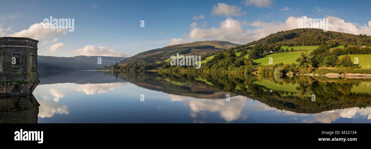 A panoramic shot of Talybont Reservoir captured on a bright Autumn morning. Stock Photo