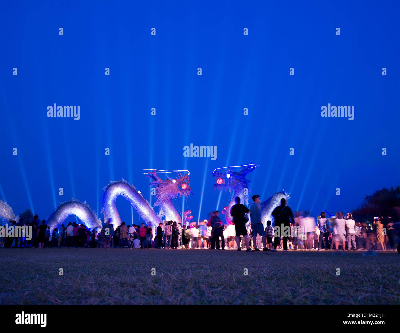 GIMJE, SOUTH KOREA - SEPTEMBER 23, 2017: Evening at Gimje Horizon Festival at Byeokgolje Reservoir showing 2 giant bamboo dragon which represent guard Stock Photo