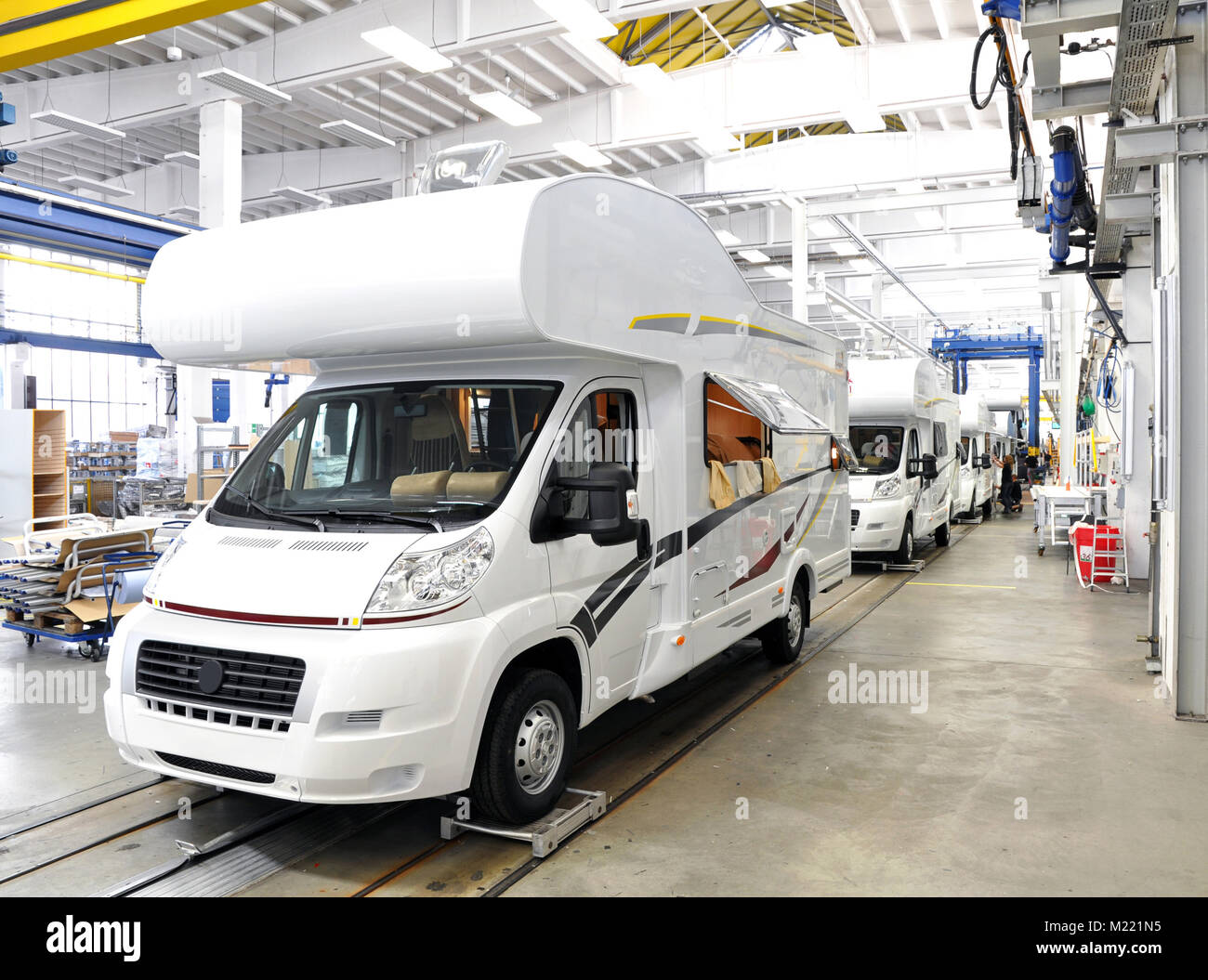 quality control of finished assembly of motorhomes / camper vans in the production line in a factory Stock Photo
