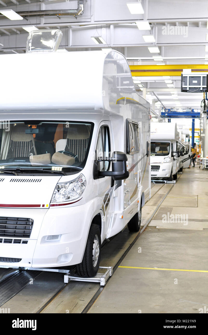 quality control of finished assembly of motorhomes / camper vans in the production line in a factory Stock Photo