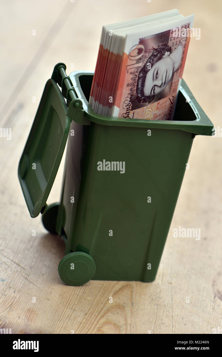 Money in the bin pounds hires stock photography and images Alamy