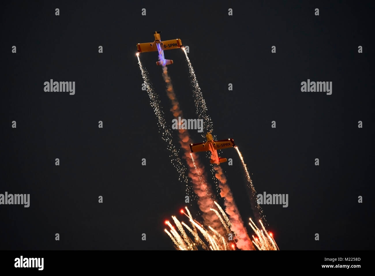 Fireflies Pyrotechnics dusk flying display at the Clacton Airshow, Essex, UK Stock Photo