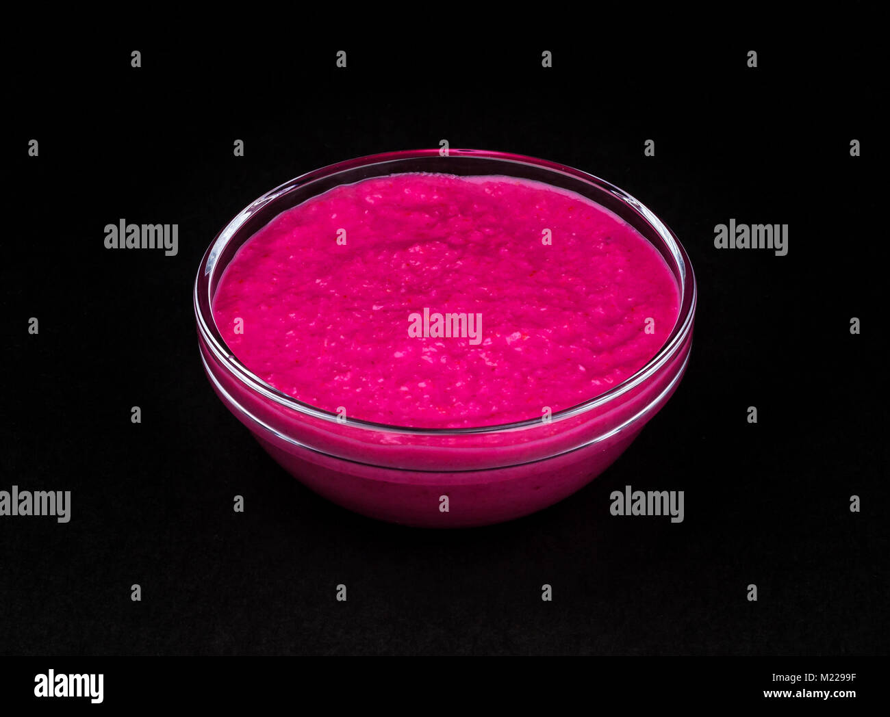 Red horseradish sauce on black background Stock Photo Alamy