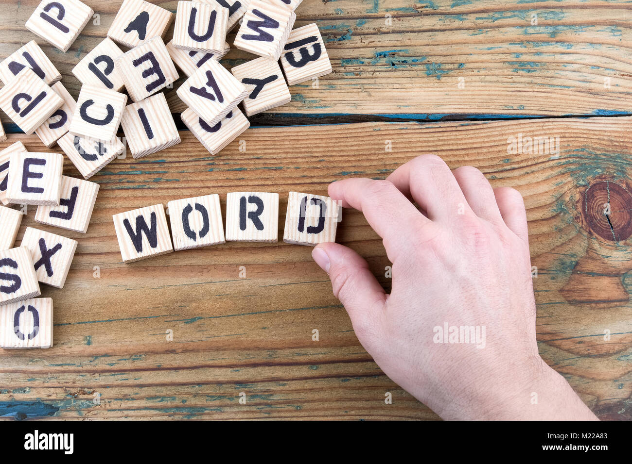 word. Wooden letters on the office desk, informative and communication