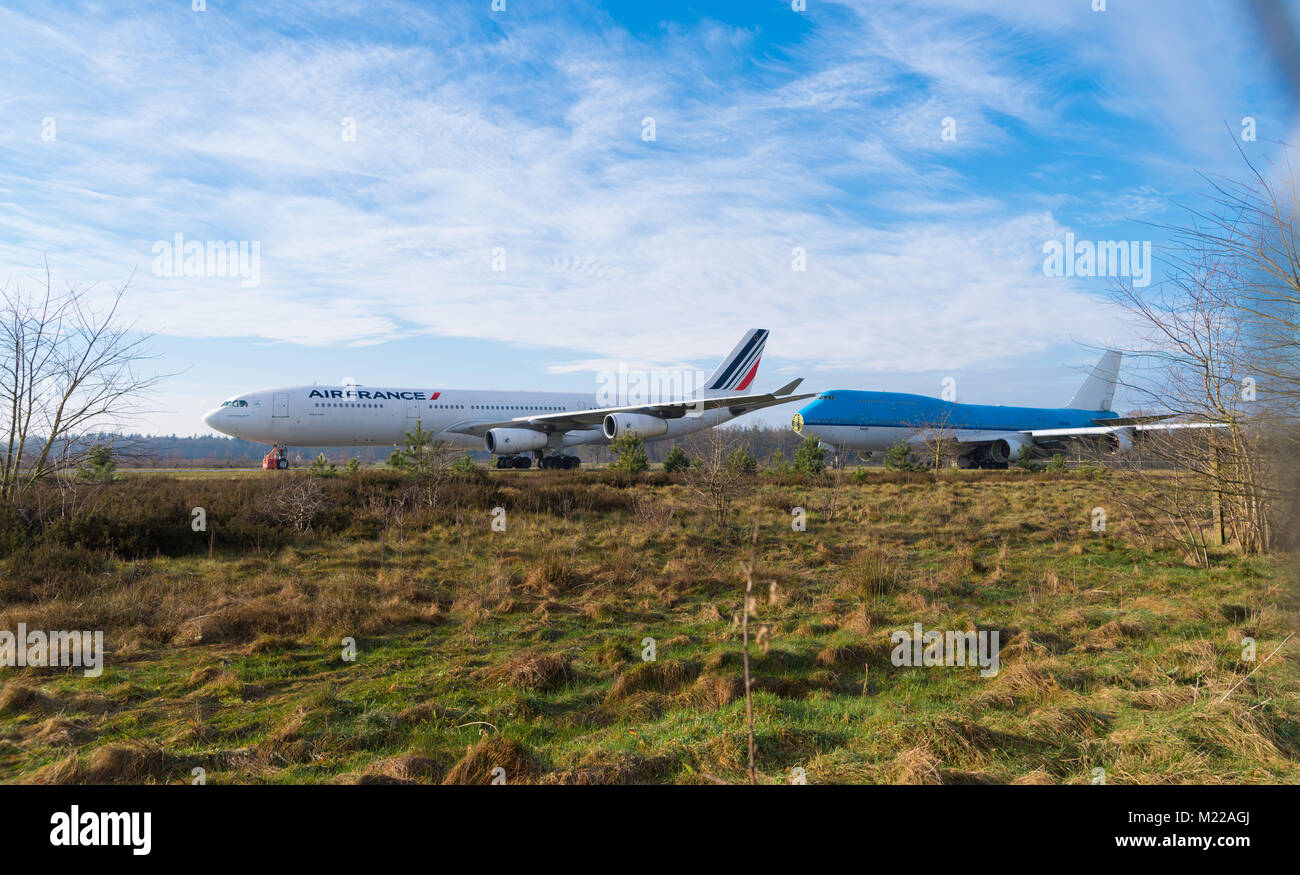 ENSCHEDE, NETHERLANDS - FEBRUARY 3, 2018: Two commercial passenger airplanes to be dismantled on a former military airfield Stock Photo