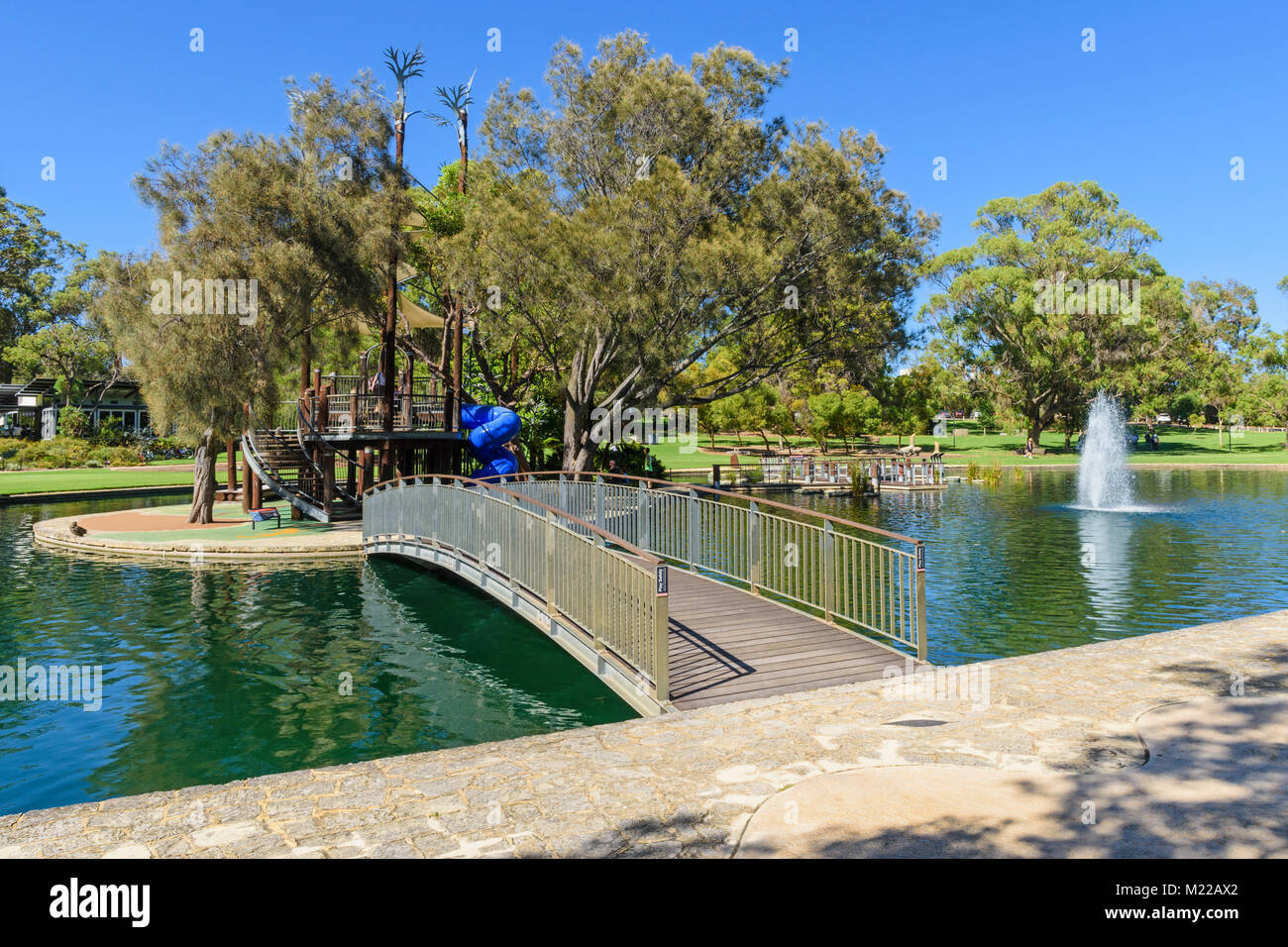 Bridge over to Lycopod Island in the pond at May Drive Parkland playground, Kings Park, Perth, Western Australia Stock Photo