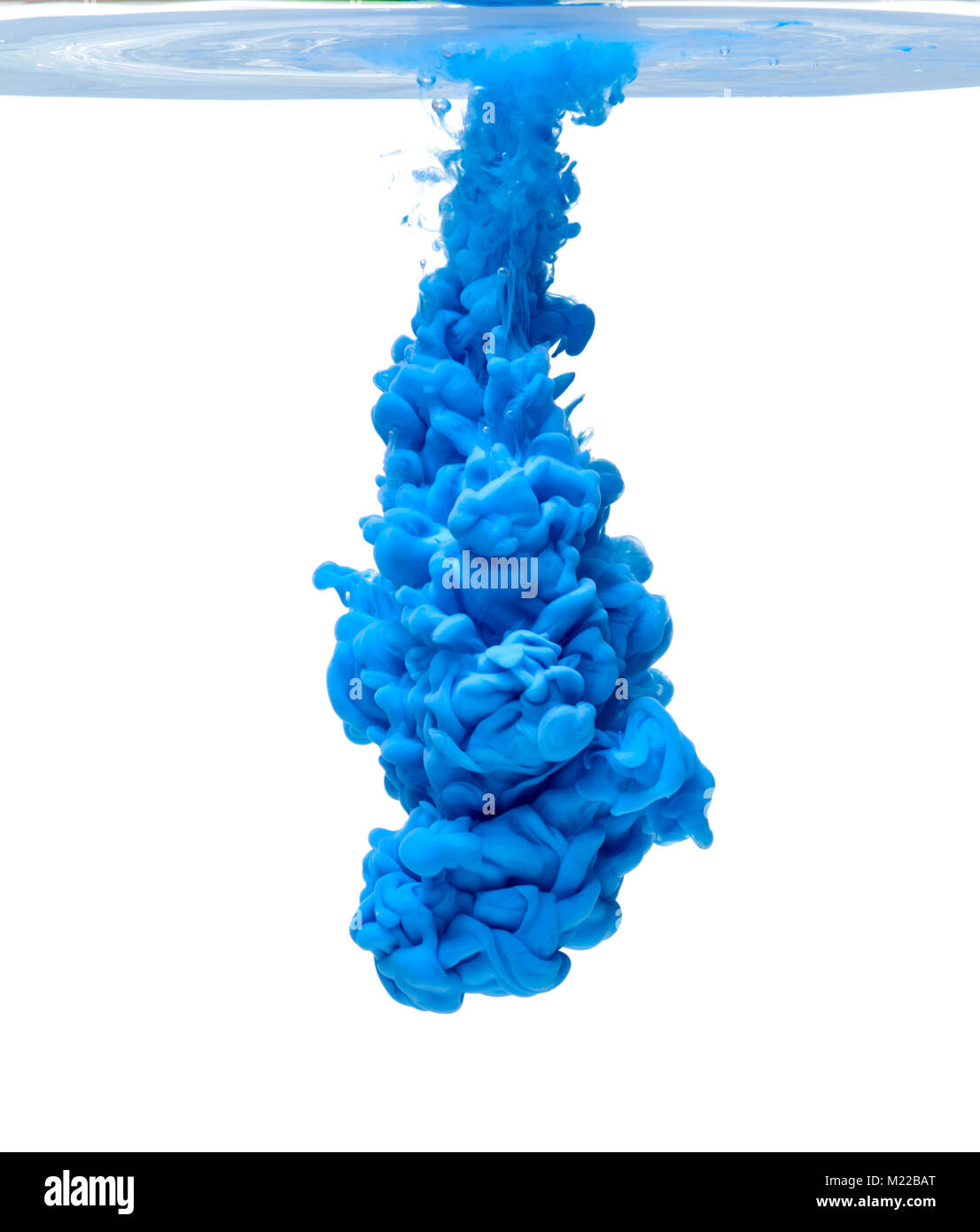blue color paint pouring in water Stock Photo