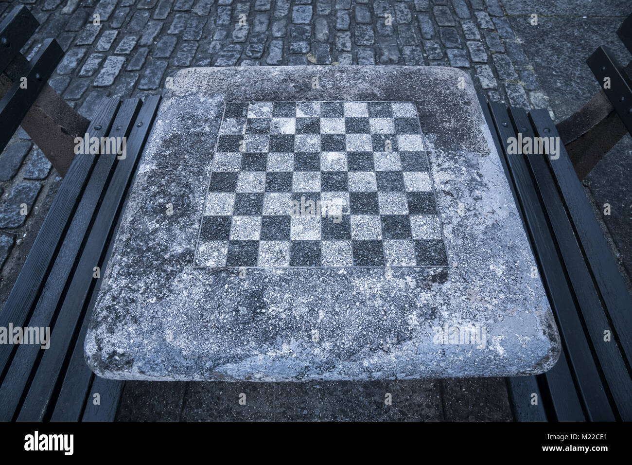 Built in chess board on a table in a pocket park in Brooklyn, NY Stock