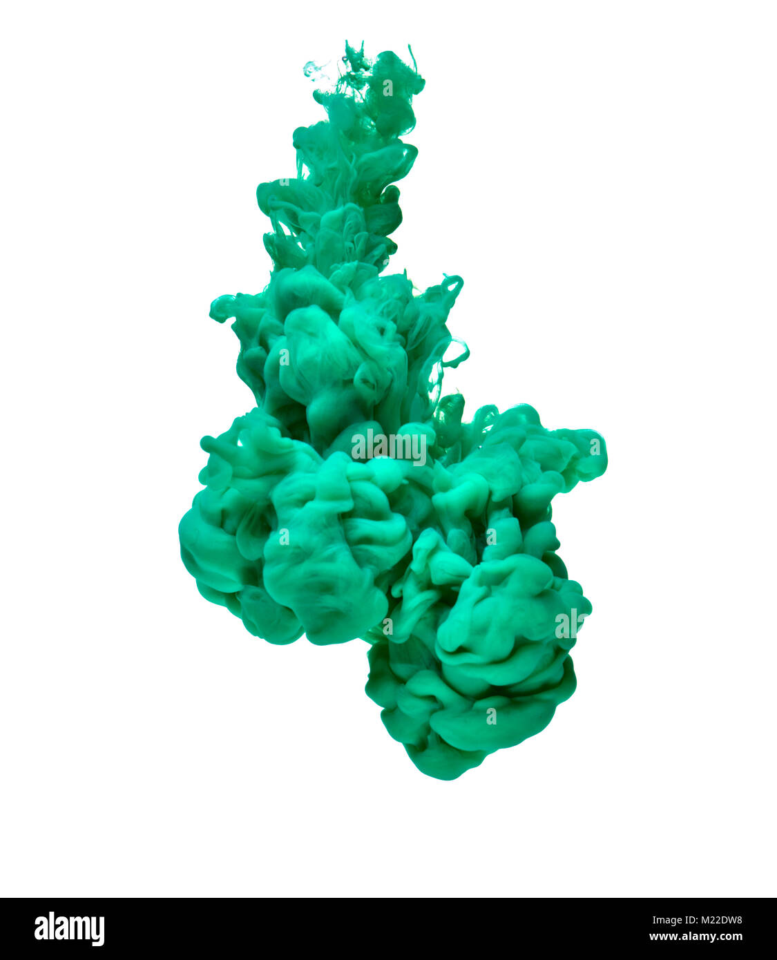 green color paint pouring in water Stock Photo