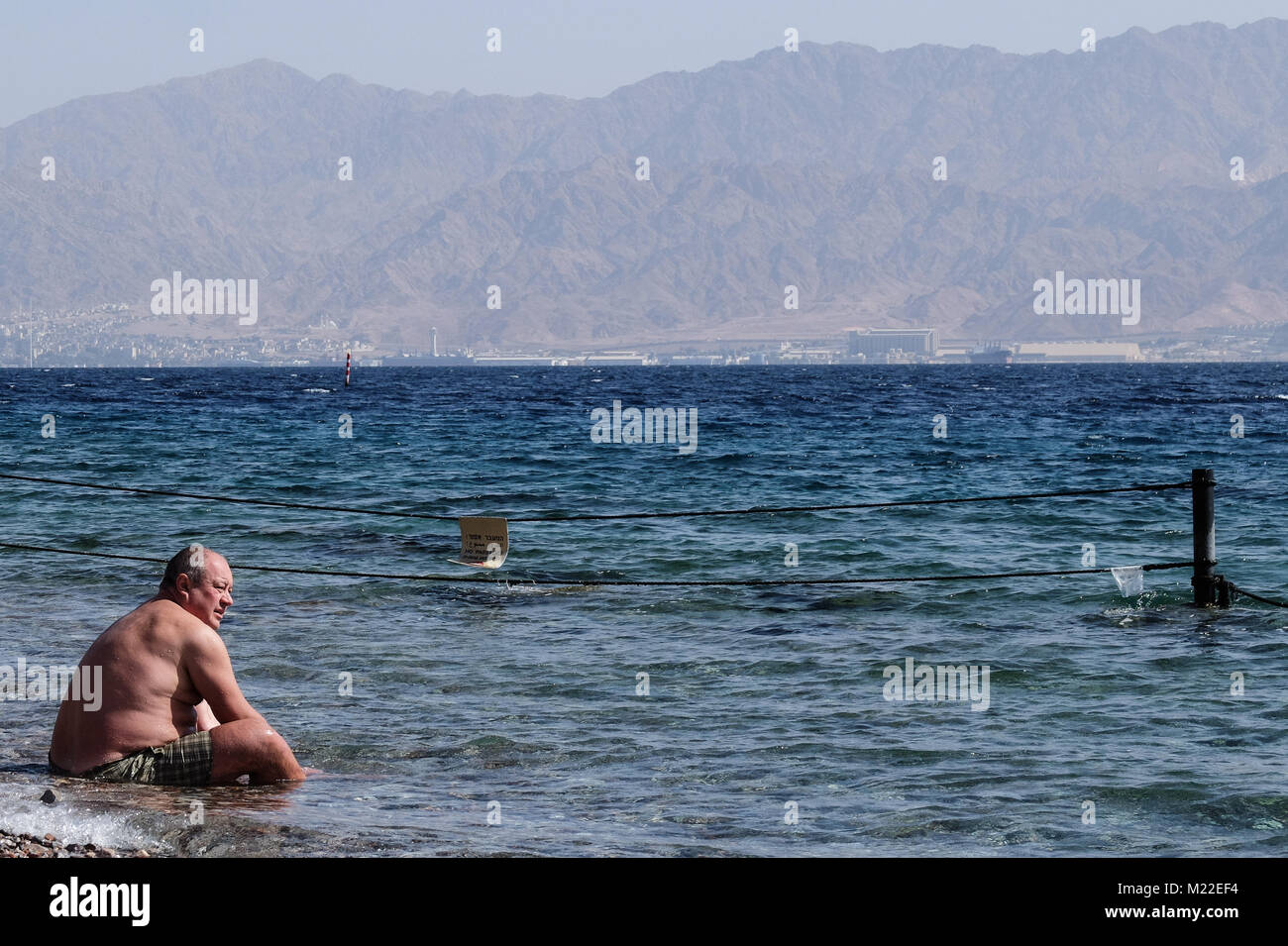Israel's southernmost city, Eilat, is situated in the Southern Negev Desert at the northern tip of the Red Sea, on the Gulf of Aqaba. The city's beach Stock Photo