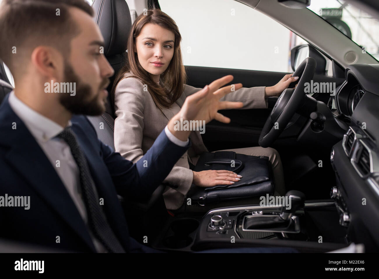 Woman sitting behind wheel hi-res stock photography and images - Alamy