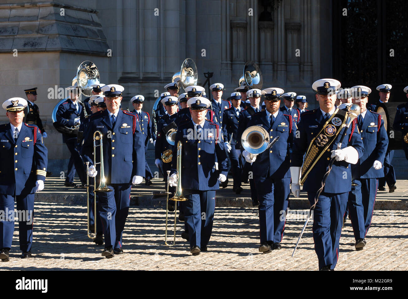 The U.S. Coast Guard Band marches during the state funeral service held