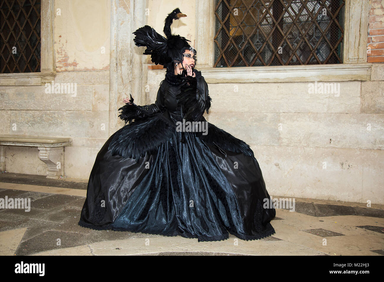 Black Swan halloween costume - Female Venetian Mask - Venice Carnival Stock Photo