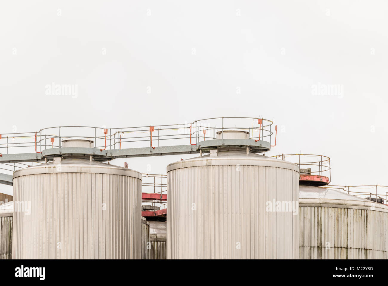 Day view factory storage tanks in UK Stock Photo Alamy