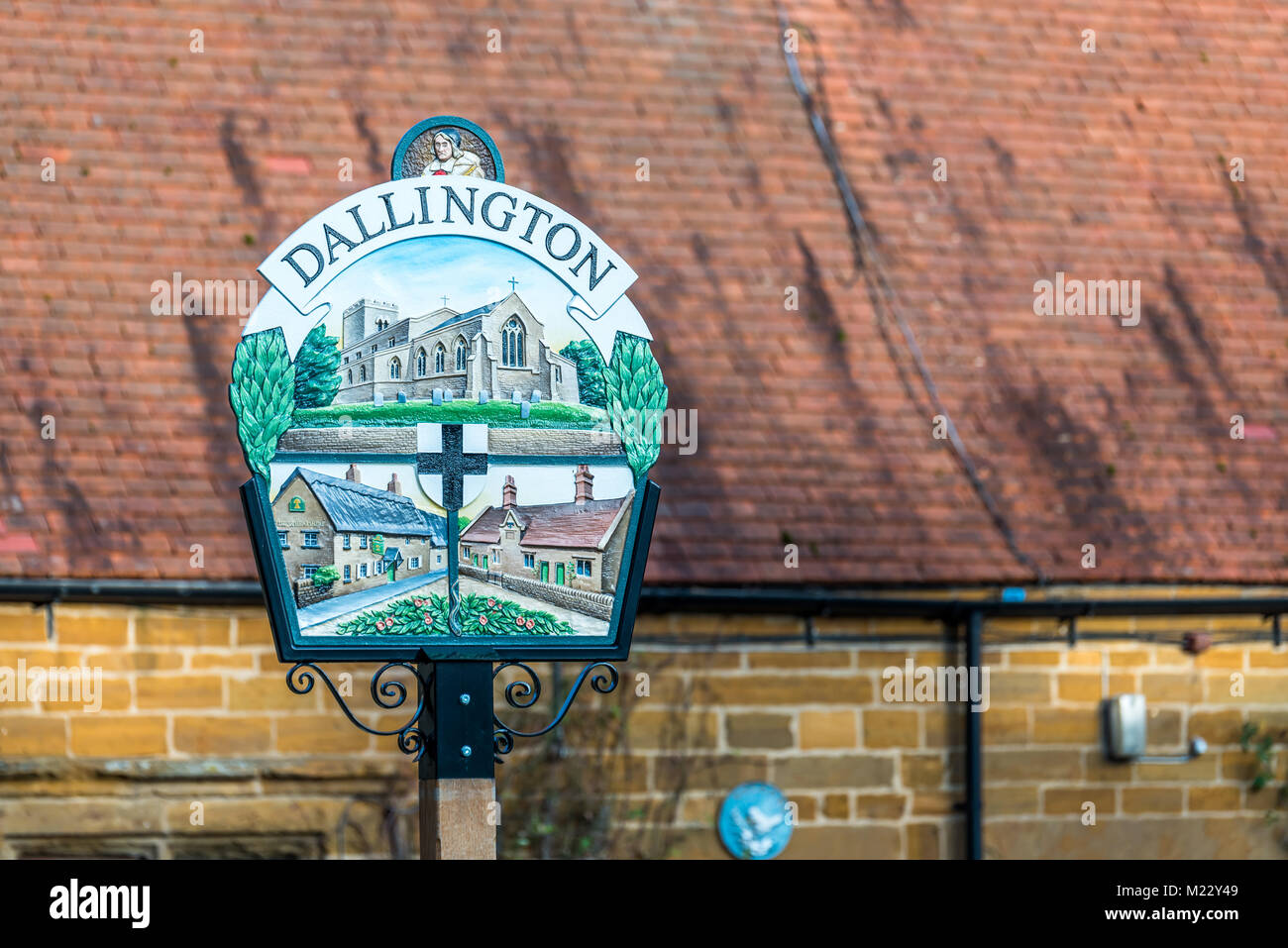 Closeup view of Dallington Village Sign Post Northampton UK Stock Photo