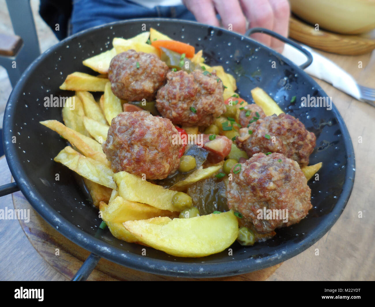 Spanish tapas bar dish of Meatballs with fries/chips, Fuengirola, Spain