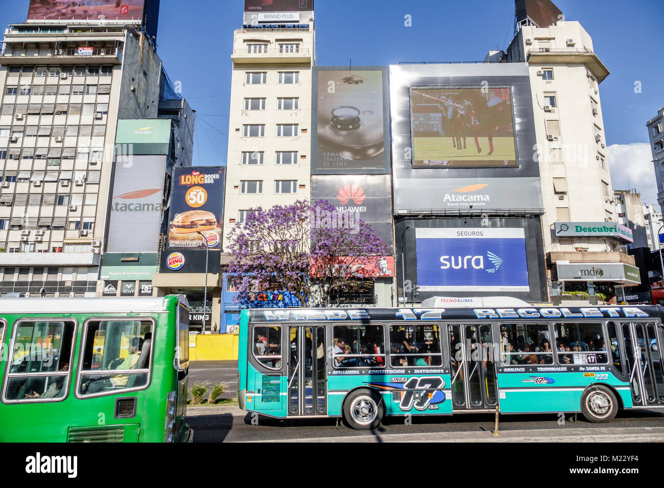 Buenos Aires Argentina,Avenida 9 de Julio,July 9 Avenue,major road,buildings,dedicated bus lane,ads,billboards,Hispanic,Argentinean Argentinian Argent Stock Photo
