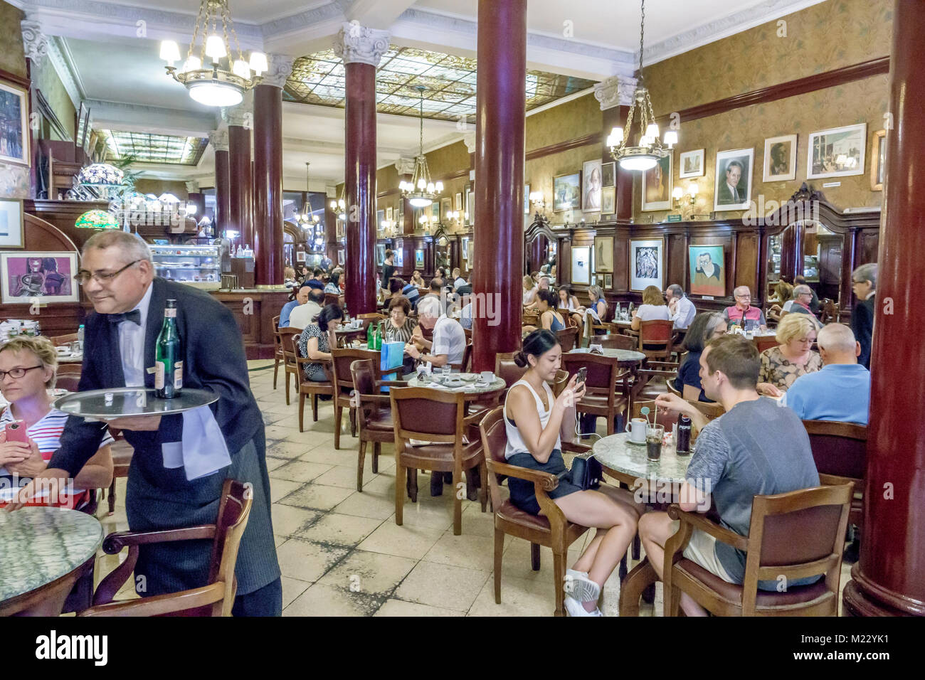 Buenos Aires Argentina,Cafe Tortoni,landmark,iconic coffeehouse,restaurant restaurants food dining cafe cafes,interior inside,tables,decor,man men mal Stock Photo