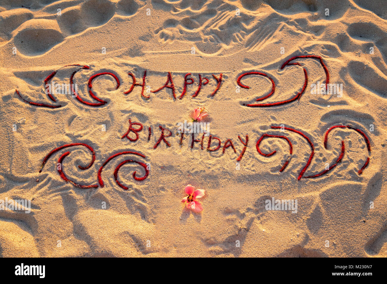 Handwritten on the sand "Happy birthday Stock Photo Alamy