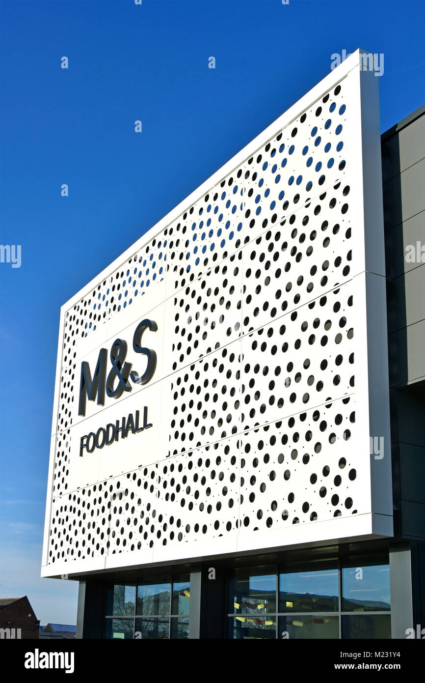 Modern dots design of front fascia & sign new M&S foodhall modern store building on Clock Tower Retail Park blue sky day Chelmsford Essex England UK Stock Photo