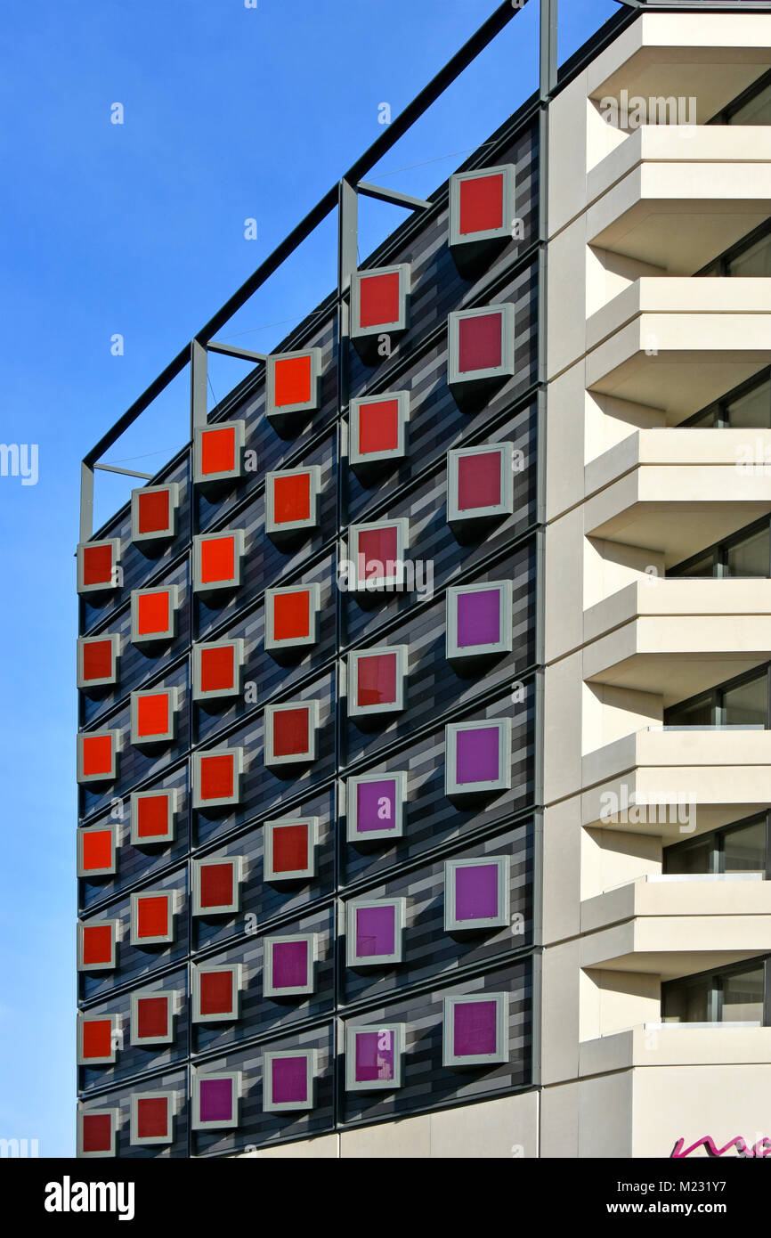 Moxy Hotel brand of Marriot International colourful window side panels new build hotel close to the station at Stratford Newham East London England UK Stock Photo