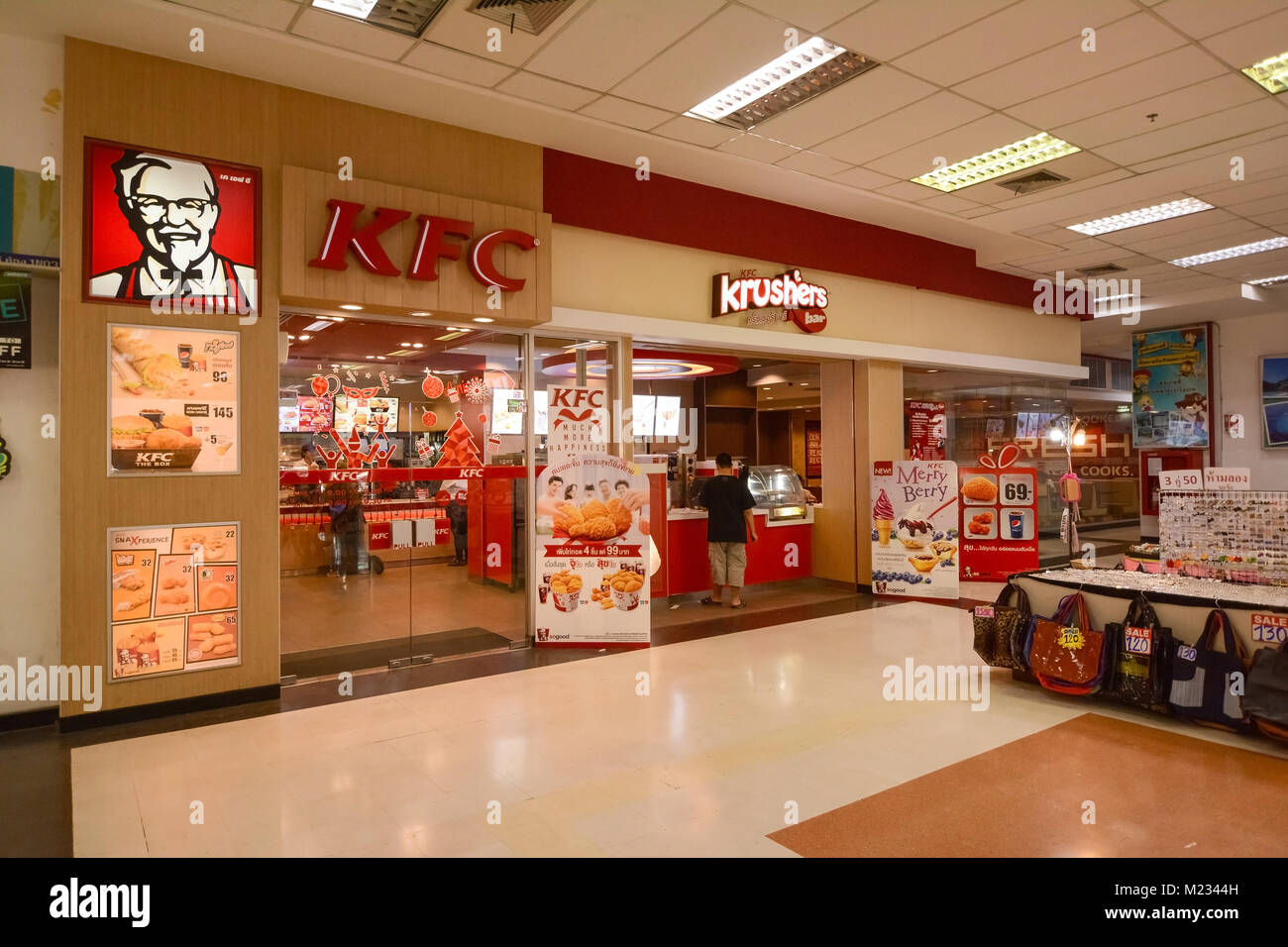 Bangkok, Thailand - January 6, 2016: KFC shop in Bangkok, Southern bus terminal commercial area. KFC is a multinational chain of fast food restaurants Stock Photo